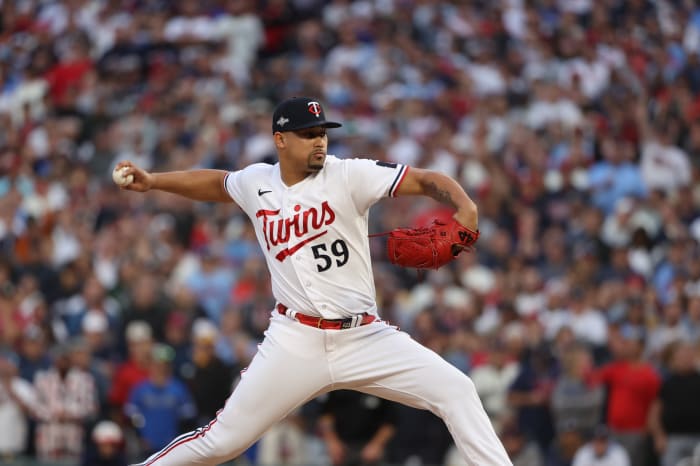 Oct 4, 2023; Minneapolis, Minnesota, USA; Minnesota Twins relief pitcher Jhoan Duran (59) delivers a pitch in the ninth inning against the Toronto Blue Jays during game two of the Wildcard series for the 2023 MLB playoffs at Target Field.
